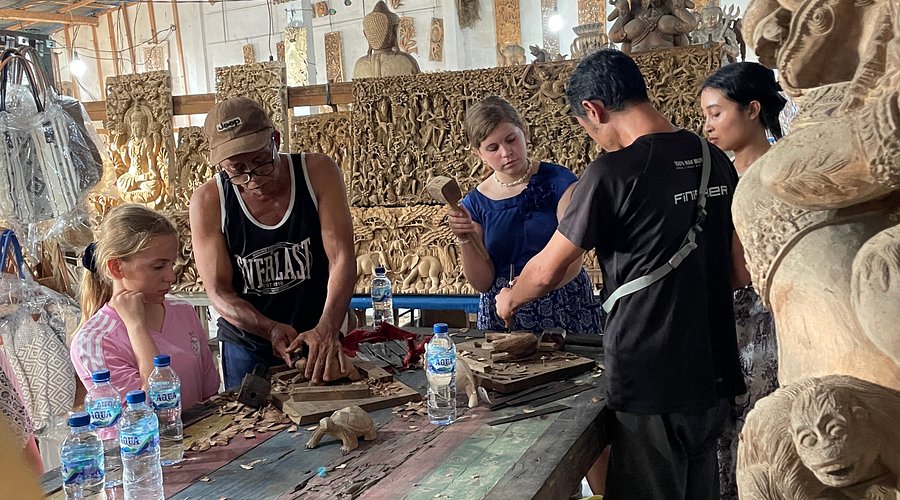 Family joining a Balinese craft workshop