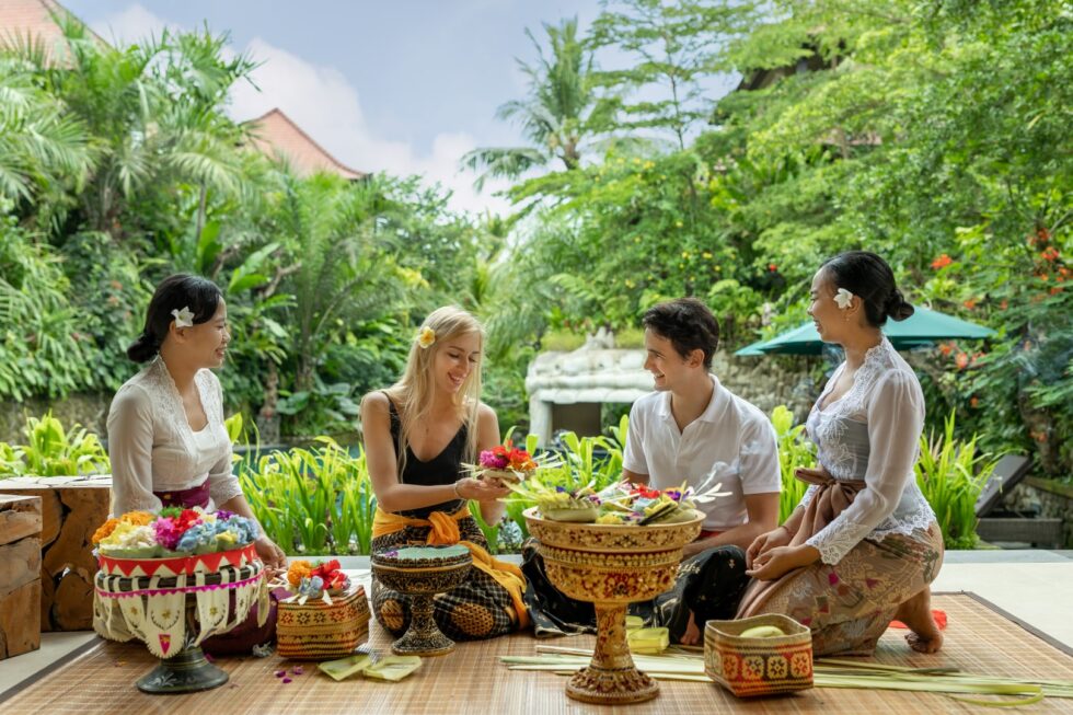Tourists participating in an offering-making workshop in Ubud.