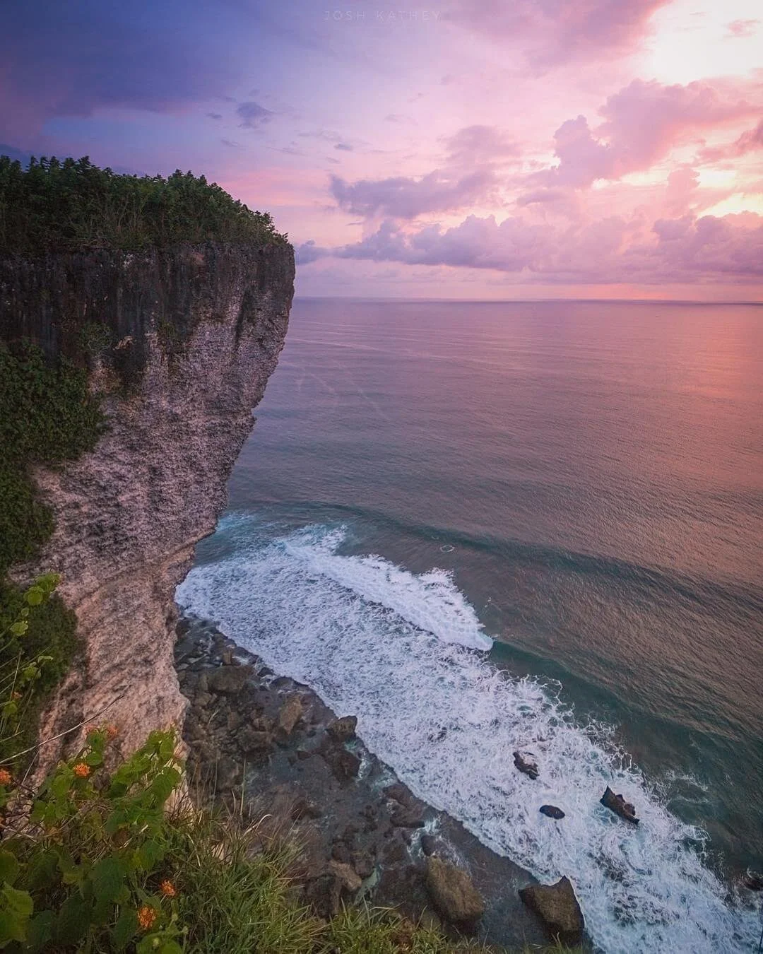 https://images.squarespace-cdn.com/content/v1/63a162ea8ae00d39baefb4ff/659b23ab-2b1f-4767-9b85-0a67a304fd44/karang-boma-cliff-uluwatu-bali-josh-kathey.jpg
